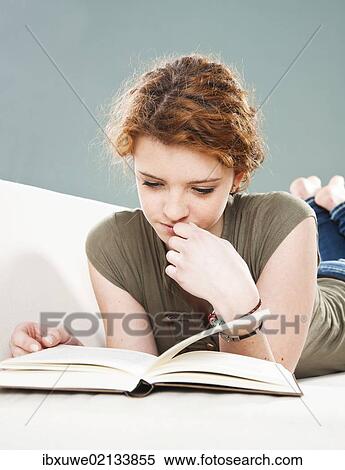 Stock Photography - Girl reading a book. Fotosearch