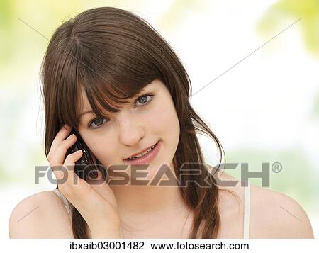 "Girl, teenager, making a call on a mobile phone" View Large Photo Image Stock Image - "Girl, teenager, making a call on a mobile phone". Fotosearch