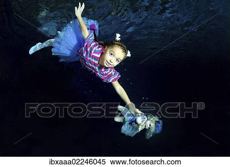 "Girl, underwater model, presenting fashion in pool, Odessa, Ukraine, Eastern Europe, Europe" View Large Photo Image Stock Photography - "Girl, underwater model, presenting fashion in pool, Odessa, Ukraine, Eastern Europe, Europe". Fotosearch