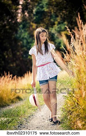 "Girl walking, outdoor" View Large Photo Image Stock Photography - "Girl walking, outdoor". Fotosearch