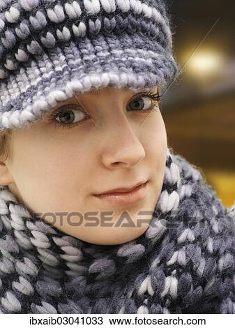 Girl wearing a hat and a scarf View Large Photo Image Stock Image - Girl wearing a hat and a scarf. Fotosearch