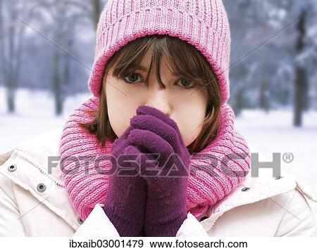 "Girl with a pink woolly hat, portrait, winter" View Large Photo Image Stock Photo - "Girl with a pink woolly hat, portrait, winter". Fotosearch