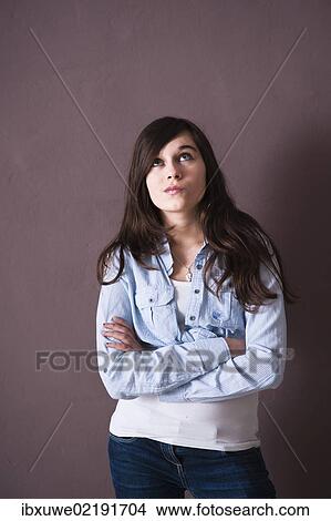 Girl with a skeptical expression View Large Photo Image Picture - Girl with a skeptical expression. Fotosearch