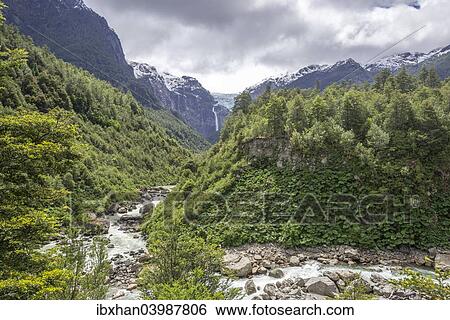 "Glacial river in front of the Ventisquero Colgante, hanging glacier, Parc National Queulat, Puerto Puyuhuapi, Aysen, Chile, South America" View Large Photo Image Stock Photograph - "Glacial river in front of the Ventisquero Colgante, hanging glacier, Parc National Queulat, Puerto Puyuhuapi, Aysen, Chile, South America". Fotosearch