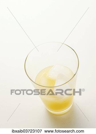 Glass of Pernod with ice cubes View Large Photo Image Stock Photo - Glass of Pernod with ice cubes. Fotosearch