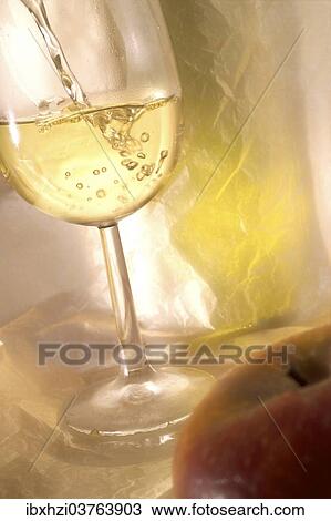 "Glass of white wine, apple" View Large Photo Image Stock Image - "Glass of white wine, apple". Fotosearch