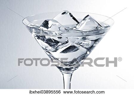 Stock Photograph - Glass with ice cubes. Fotosearch