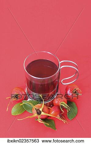 Glass with rose hip tea and rose hips View Large Photo Image Stock Image - Glass with rose hip tea and rose hips. Fotosearch