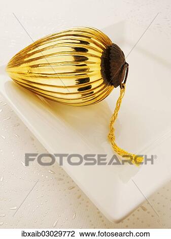 Golden Christmas tree decoration View Large Photo Image Stock Image - Golden Christmas tree decoration. Fotosearch