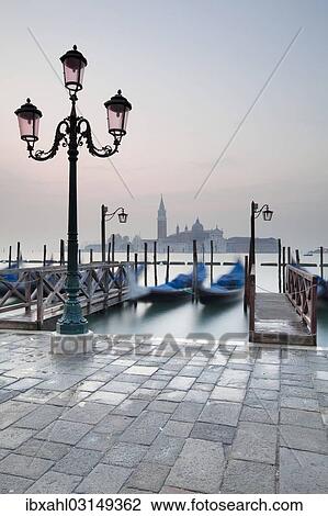 Stock Image - "Gondolas and San Giorgio Maggiore from St Mark's Square, Venice, Venezien, Italy, Europe". Fotosearch