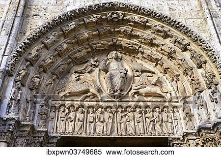 Stock Photography - "Gothic sculptures of Christ Pantocrator surrounded by the four Evangelist symbols, west facade, central portal tympanum, circa 1145, Cathedral of Chartres, UNESCO World Heritage Site, France, Europe". Fotosearch
