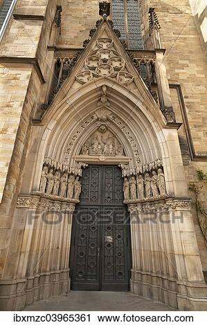 Stock Image - "Gothic side entrance, St Mary's Church, 14th-15th century, Osnabruck, Lower Saxony, Germany, Europe". Fotosearch
