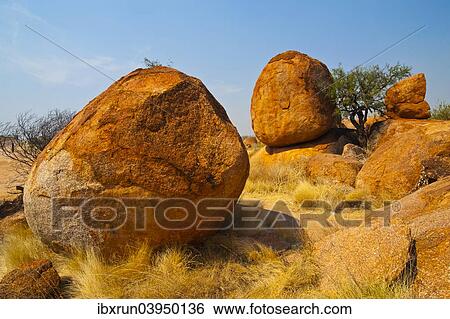 "Granite boulders in the Devil's Marbles Conservation Reserve, Karlu Karlu, Northern Territories, Australia, Oceania" View Large Photo Image Stock Photograph - "Granite boulders in the Devil's Marbles Conservation Reserve, Karlu Karlu, Northern Territories, Australia, Oceania". Fotosearch