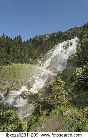 Stock Photo - "Grawa waterfall at the Wild Water Way, with rainbow, Grawa Alm, mountain pasture, Stubai Valley, Tyrol, Austria, Europe". Fotosearch