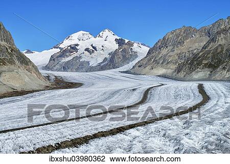 Stock Image - "Great Aletsch Glacier, the mountains Eiger, Monch and Jungfrau at the back, Canton of Valais, Goms, Switzerland, Europe". Fotosearch