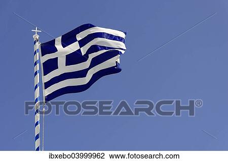 Stock Image - "Greek Flag, Thira, Santorin, Cyclades, Greece, Europe". Fotosearch