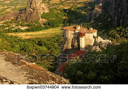 "Greek Orthodox Roussanou Monastery, front, and Monastery of St Nicholas Anapafsas, at the back, Meteora Mountains, Greece, Europe" View Large Photo Image Picture - "Greek Orthodox Roussanou Monastery, front, and Monastery of St Nicholas Anapafsas, at the back, Meteora Mountains, Greece, Europe". Fotosearch