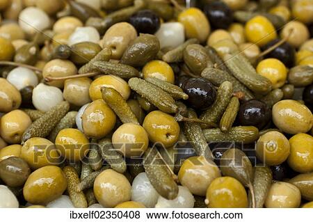 "Green and black olives, pickles, onions, weekly market, Majorca, Spain, Europe" View Large Photo Image Stock Photo - "Green and black olives, pickles, onions, weekly market, Majorca, Spain, Europe". Fotosearch