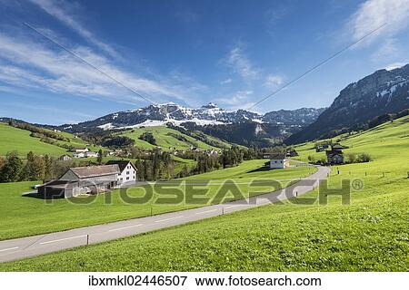 "Green pastures in Appenzellerland in front of the snow-capped Appenzell Alps, Canton of Appenzell-Innerrhoden, Switzerland, Europe" View Large Photo Image Stock Photo - "Green pastures in Appenzellerland in front of the snow-capped Appenzell Alps, Canton of Appenzell-Innerrhoden, Switzerland, Europe". Fotosearch