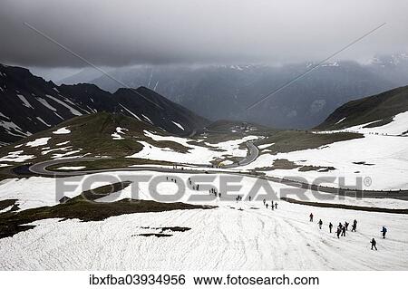 "Grossglockner pilgrimage from Fisch and Rauris, Salzburg State, to Heiligenblut, to St. Peter and Paul, here pilgrims on the way down to Heiligenblut, Carinthia, Austria, Europe" View Large Photo Image Stock Photograph - "Grossglockner pilgrimage from Fisch and Rauris, Salzburg State, to Heiligenblut, to St. Peter and Paul, here pilgrims on the way down to Heiligenblut, Carinthia, Austria, Europe". Fotosearch