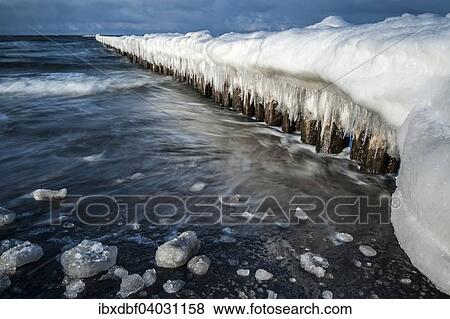 "Groynes covered with snow and icicles, Baltic Sea, Zingst, Fischland-Darss-Zingst, Mecklenburg-Western Pomerania, Germany, Europe" View Large Photo Image Stock Photo - "Groynes covered with snow and icicles, Baltic Sea, Zingst, Fischland-Darss-Zingst, Mecklenburg-Western Pomerania, Germany, Europe". Fotosearch