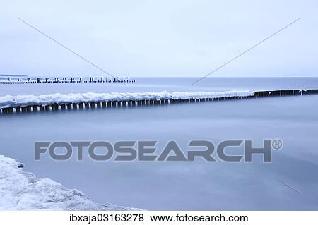 "Groynes on the Baltic Sea in winter, Zingst, Fischland-Darss-Zingst, Mecklenburg-Western Pomerania, Germany, Europe" View Large Photo Image Stock Photo - "Groynes on the Baltic Sea in winter, Zingst, Fischland-Darss-Zingst, Mecklenburg-Western Pomerania, Germany, Europe". Fotosearch