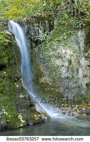 Stock Photo - "Guetenstein Waterfalls in autumn, Maisental valley, Bad Urach, Baden-Wurttemberg, Germany, Europe". Fotosearch