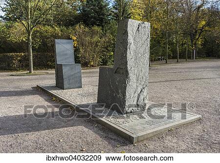 Stock Photo - "Hafez monument, two chairs from a block of granite, bronze base plate with verses of Goethe and Hafez, by Ernst Thevis and Fabian Rabsch, donated in 2000 by UNESCO, Weimar, Thuringia, Germany, Europe". Fotosearch