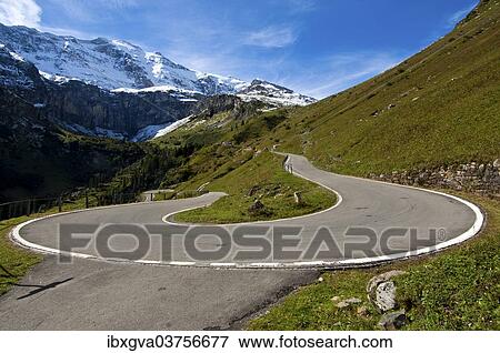 "Hairpin curve, mountain road to the Klausen Pass in front of the Glarus Alps, Urnerboden, Canton of Uri, Switzerland, Europe" View Large Photo Image Stock Photo - "Hairpin curve, mountain road to the Klausen Pass in front of the Glarus Alps, Urnerboden, Canton of Uri, Switzerland, Europe". Fotosearch