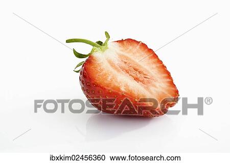 Stock Image - Half a Strawberry (Fragaria). Fotosearch