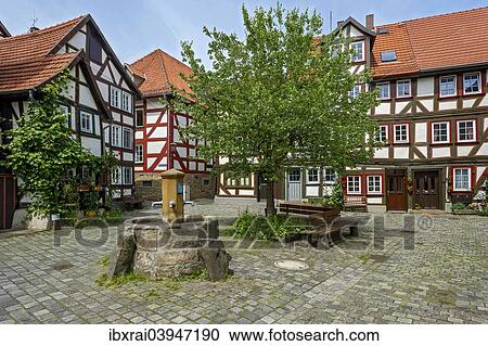 "Half-timbered houses and fountain on a small square, Grabbrunnen, historic centre, Alsfeld, Hesse, Germany, Europe" View Large Photo Image Stock Image - "Half-timbered houses and fountain on a small square, Grabbrunnen, historic centre, Alsfeld, Hesse, Germany, Europe". Fotosearch