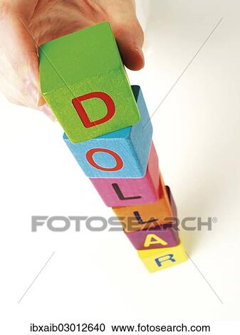 "Hand building a tower out of blocks, forming the word dollar" View Large Photo Image Stock Image - "Hand building a tower out of blocks, forming the word dollar". Fotosearch