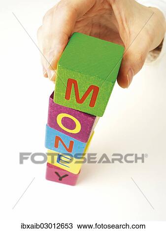 "Hand building a tower out of blocks, forming the word money" View Large Photo Image Stock Image - "Hand building a tower out of blocks, forming the word money". Fotosearch