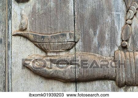 "Hand holding an oil lamp, door carving, Somatheeram Ayurvedic Health Resort, Chowara, Malabar, South India, India, Asia" View Large Photo Image Stock Image - "Hand holding an oil lamp, door carving, Somatheeram Ayurvedic Health Resort, Chowara, Malabar, South India, India, Asia". Fotosearch