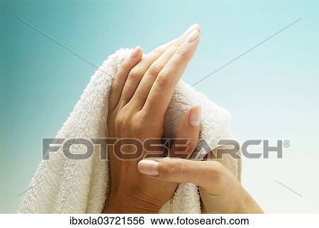 Stock Photograph - "Hands are dried with a towel, hand hygiene, Germany, Europe". Fotosearch