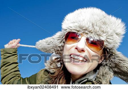 Happy woman wearing winter clothes View Large Photo Image Stock Image - Happy woman wearing winter clothes. Fotosearch