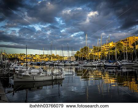 Stock Photo - "Harbour at sunset, Porto Cristo, Majorca, Balearic Islands, Spain, Europe". Fotosearch