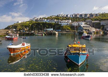 Stock Photo - "Harbour with fishing boats, Mevagissey, Cornwall, England, United Kingdom, Europe". Fotosearch