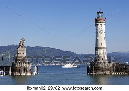 Stock Image - "Harbour with lighthouse and Bavarian lion, Lindau on Lake Constance, Swabia, Bavaria, Germany, Europe, PublicGround, Europe". Fotosearch