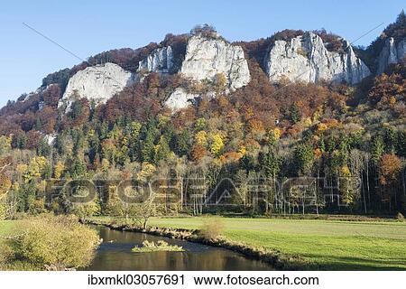 Stock Image - "Hausener Zinnen rocks in the autumnal Danube Valley, Hausen im Tal, Schwabische Alb, Baden-Wurttemberg, Germany, Europe". Fotosearch