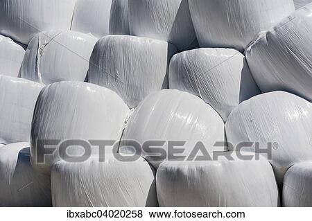 "Hay bales in plastic wrap, Bavaria, Germany, Europe" View Large Photo Image Stock Photo - "Hay bales in plastic wrap, Bavaria, Germany, Europe". Fotosearch