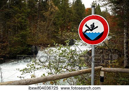 "Hazard warning sign, danger of drowning, entrance to the eastern shore of Walchensee in Niedernach, Upper Bavaria, Bavaria, Germany, Europe" View Large Photo Image Stock Photography - "Hazard warning sign, danger of drowning, entrance to the eastern shore of Walchensee in Niedernach, Upper Bavaria, Bavaria, Germany, Europe". Fotosearch
