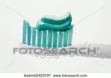 Stock Photo - "Head of a toothbrush with toothpaste, electric toothbrush". Fotosearch