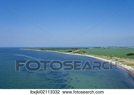"Headland at the Fehmarn Sound at Strukkamphuk, Fehmarn island, Baltic Sea, Schleswig-Holstein, Germany, Europe" View Large Photo Image Stock Image - "Headland at the Fehmarn Sound at Strukkamphuk, Fehmarn island, Baltic Sea, Schleswig-Holstein, Germany, Europe". Fotosearch