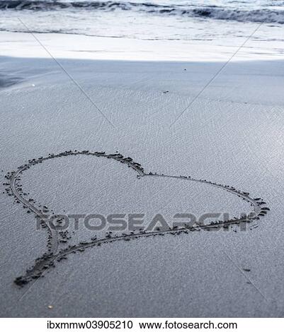 Stock Image - "Heart on the beach, drawn into the sand, black sand, La Palma, Canary Islands, Spain, Europe". Fotosearch