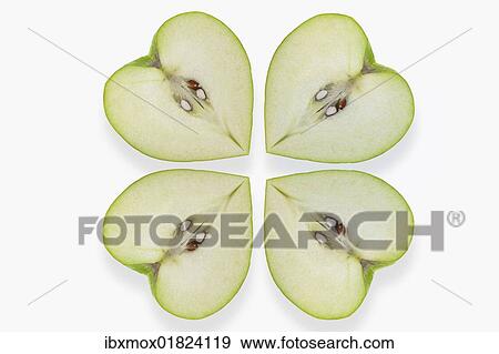 Heart-shaped apples placed like a clover leaf View Large Photo Image Stock Photo - Heart-shaped apples placed like a clover leaf. Fotosearch