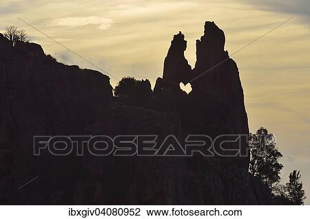 "Heart-shaped hole in a rock in the Calanche, in Porto, Corsica, France, Europe" View Large Photo Image Stock Image - "Heart-shaped hole in a rock in the Calanche, in Porto, Corsica, France, Europe". Fotosearch