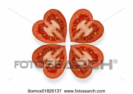 Stock Photo - Heart-shaped tomatoes arranged like a cloverleaf. Fotosearch