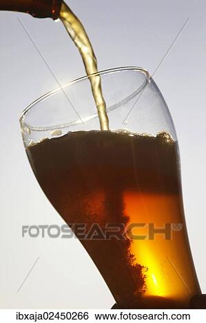 "Hefeweizen, wheat beer being poured" View Large Photo Image Stock Photograph - "Hefeweizen, wheat beer being poured". Fotosearch
