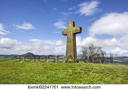 Stock Image - "Hegau Cross, 661m, in Hegau, with Hohenhewen Mountain on the horizon, Baden-Wuerttemberg, Germany, Europe". Fotosearch